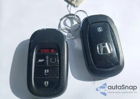 2025 Honda Cr-V Hybrid Sport Touring z USA, uszkodzony, nr VIN 7FARS6H95SE081416